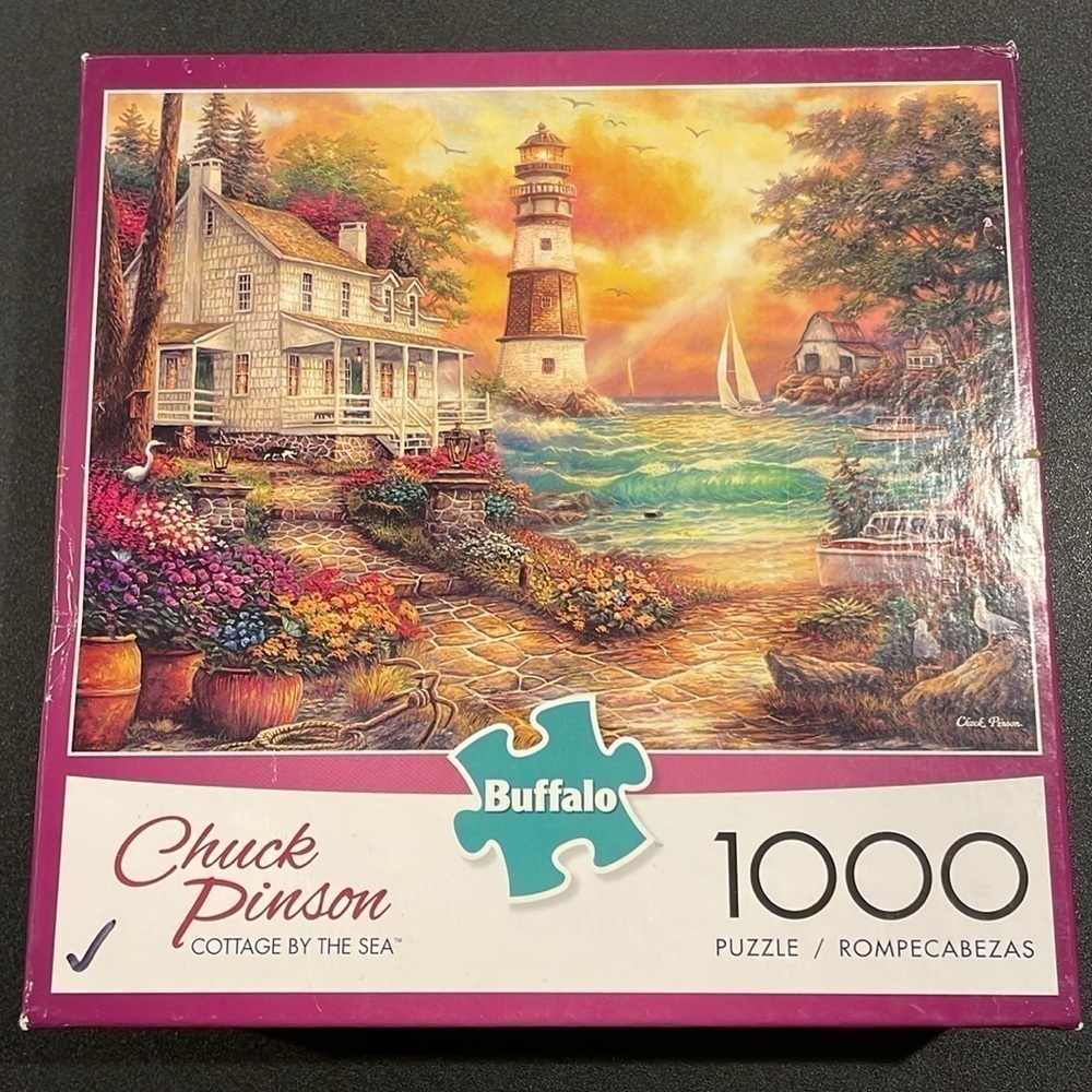 1000 piece jigsaw puzzle lighthouse ocean garden house walkway colorful